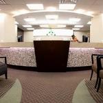 Tulsa OBGYN medical offices are designed to follow simple architectural curves to provide comfort for their client's.  The reception is centerd on the entrance and greets Tulsa OBGYN clients.  The carpet patterns are designed to bring the center of attention the check-in reception desk.